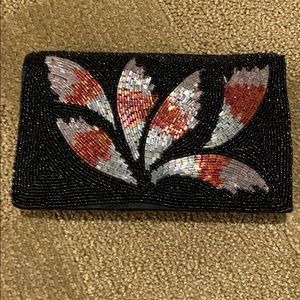 Expandable sequin cross body evening bag